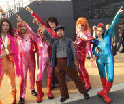 Olympics - Gilbert Wu surrounded by 70s dancers