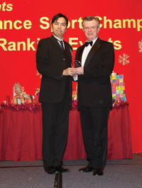Lawrence presents a congratulation souvenir to  Richard Hunt