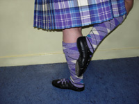The Highland costume showing the correct position of the foot at the back