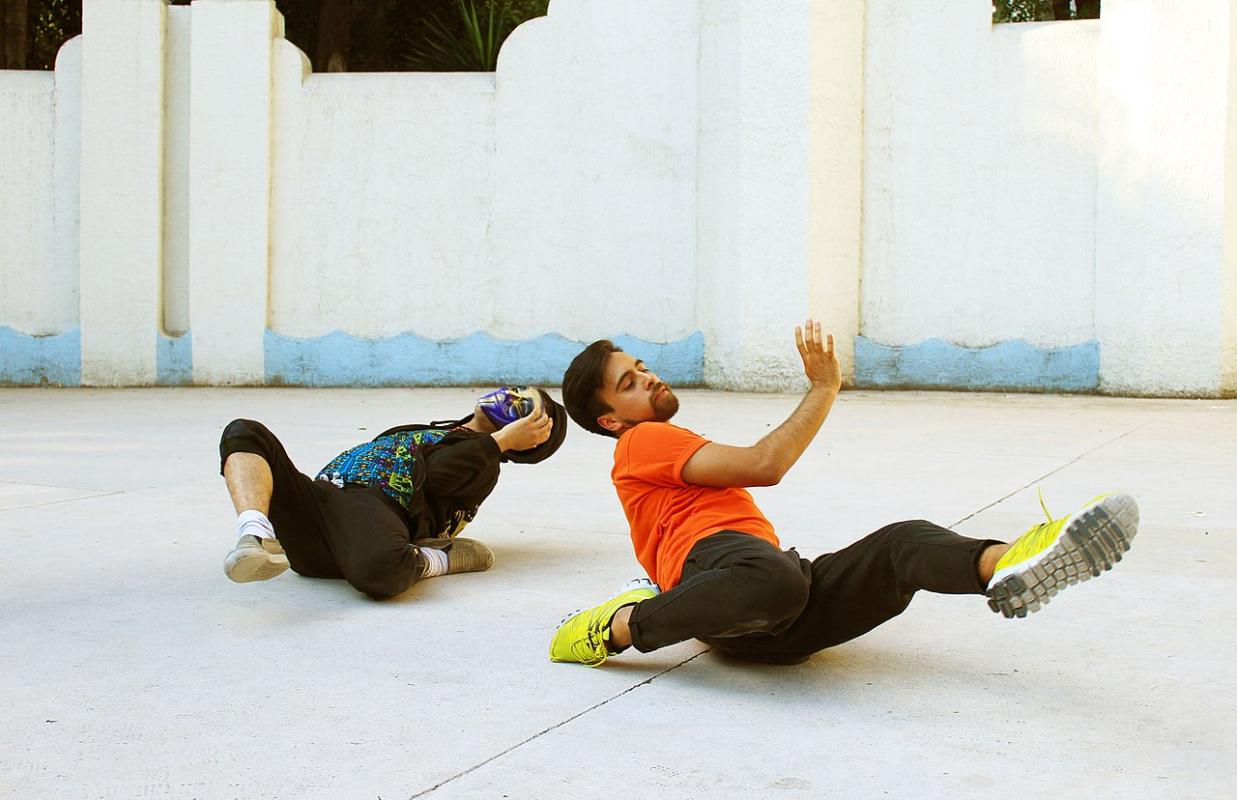 Two people voguing