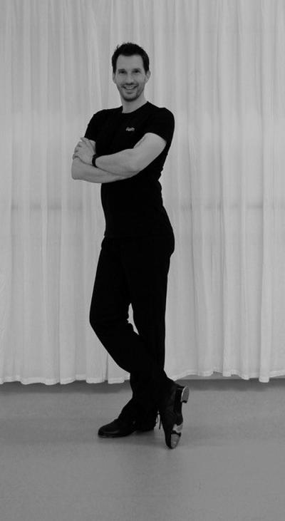 Andre Koschyk in tap dance shoes dancing