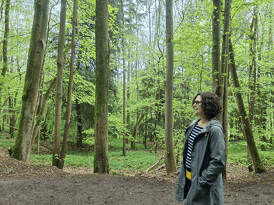 Ginny Brown walking in forest